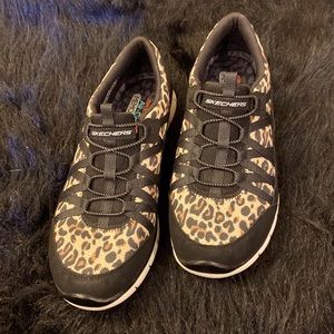 Skechers slip on memory foam sneakers. Size 9. Like new-never worn.